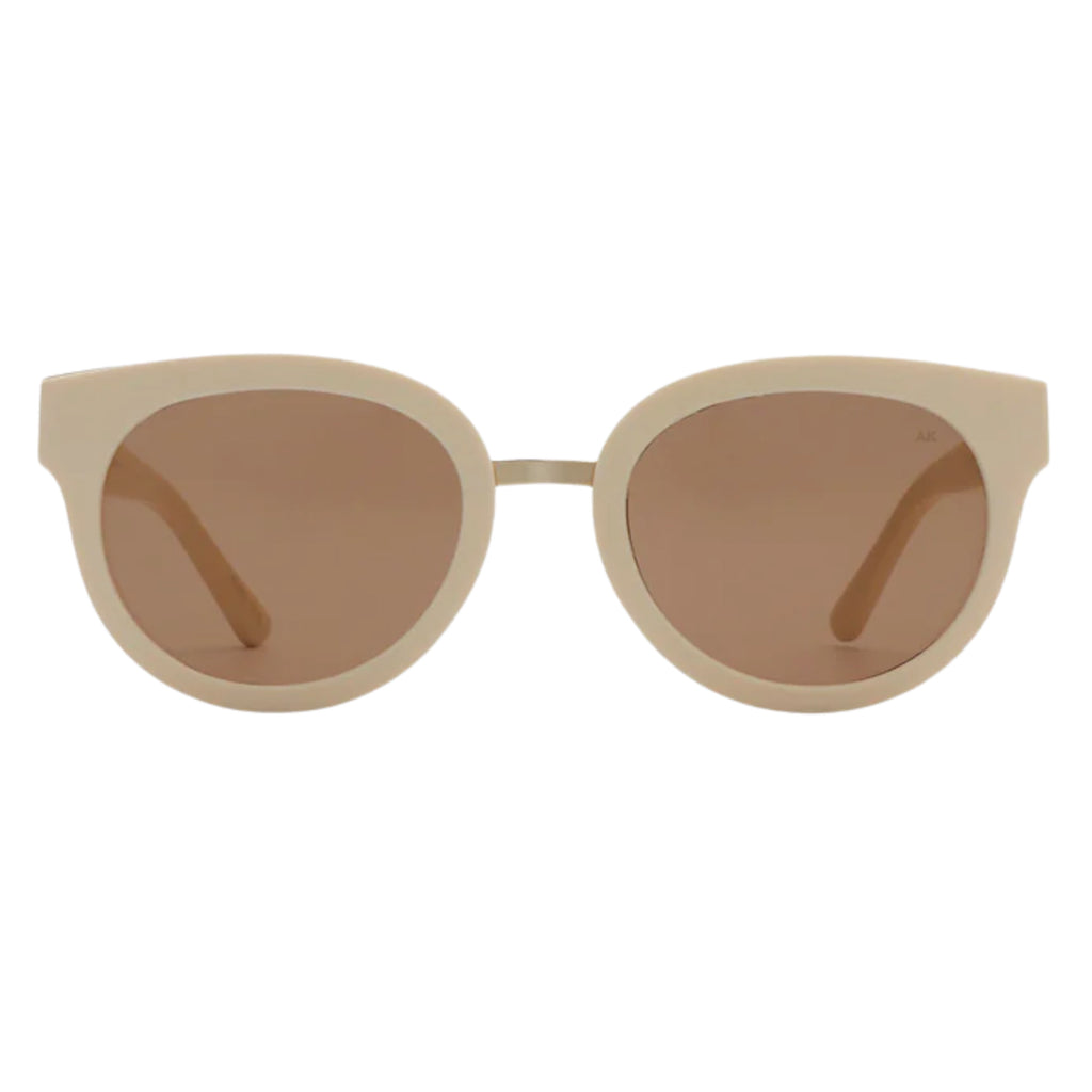 Cream Sunglasses on model with round lenses and metal bridge.
A.KJAERBEDE Jolie Cream Sunglasses - Jo And Co A.KJAERBEDE Jolie Cream Sunglasses - A.KJAERBEDE