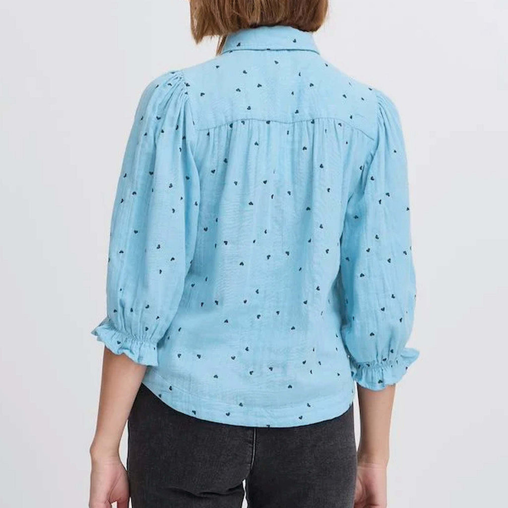 Atelier Reve Dusk Blue Camilo Blouse with heart embroidery and pan collar.