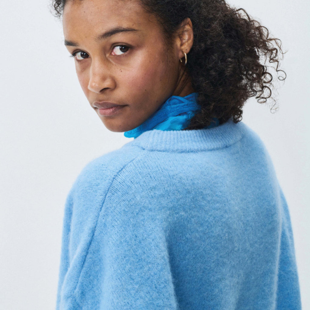 American Vintage Aura Melange Vitow Jumper in soft blue with boat neckline and ribbed edging.