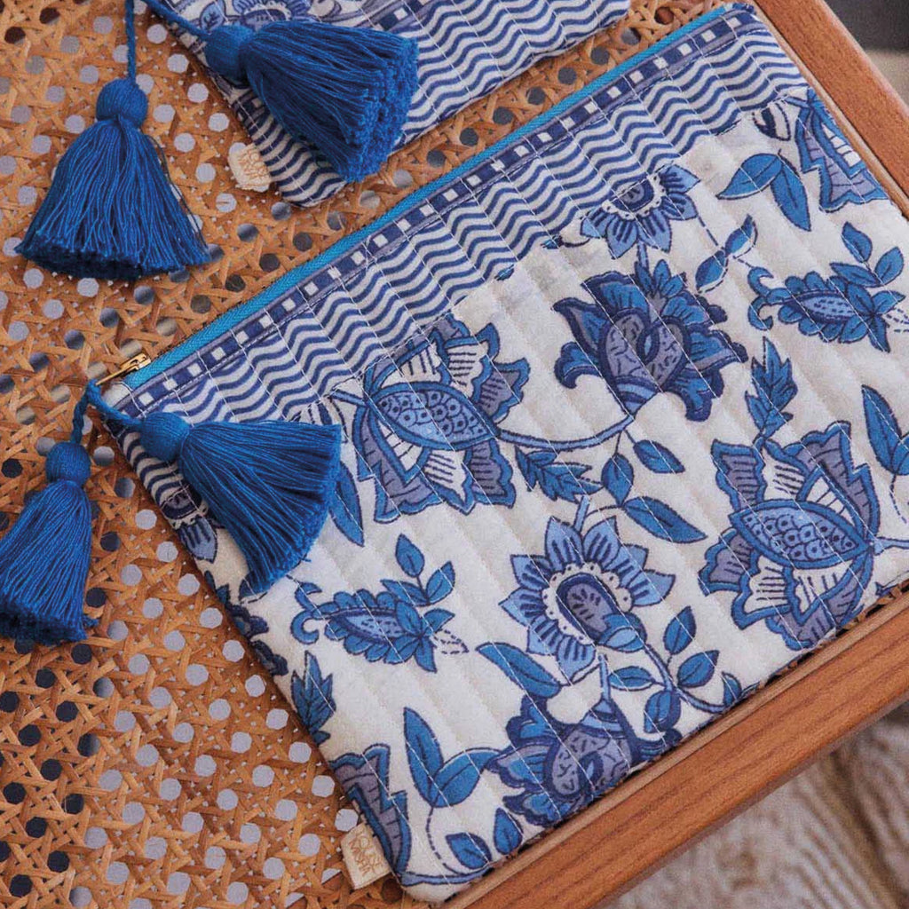 Quilted zipped pouch with blue Indian-inspired floral block-print design and handmade blue tassels.
Louise Misha Blue Lobelia Garden Domina Pouch - Jo And Co Louise Misha Blue Lobelia Garden Domina Pouch - Louise Misha