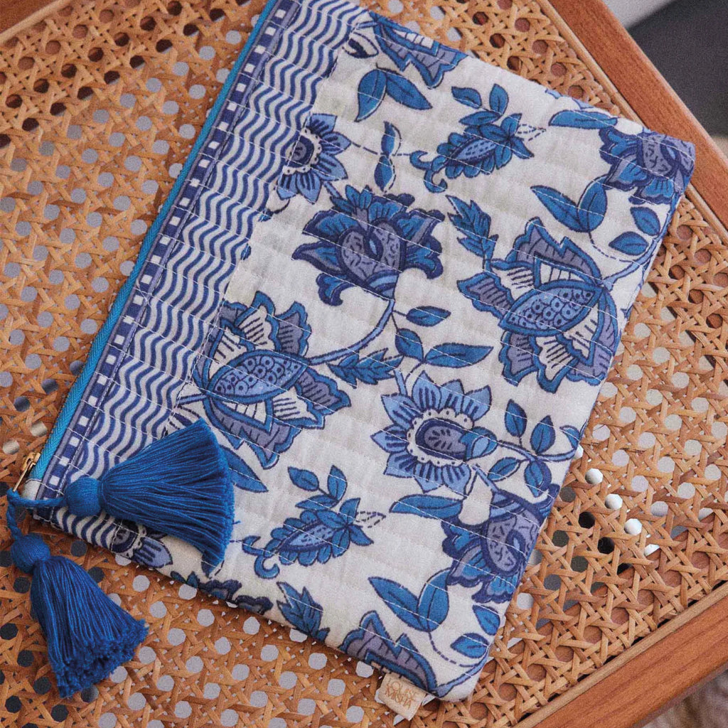 Quilted zipped pouch with blue Indian-inspired floral block-print design and handmade blue tassels.
Louise Misha Blue Lobelia Garden Domina Pouch - Jo And Co Louise Misha Blue Lobelia Garden Domina Pouch - Louise Misha