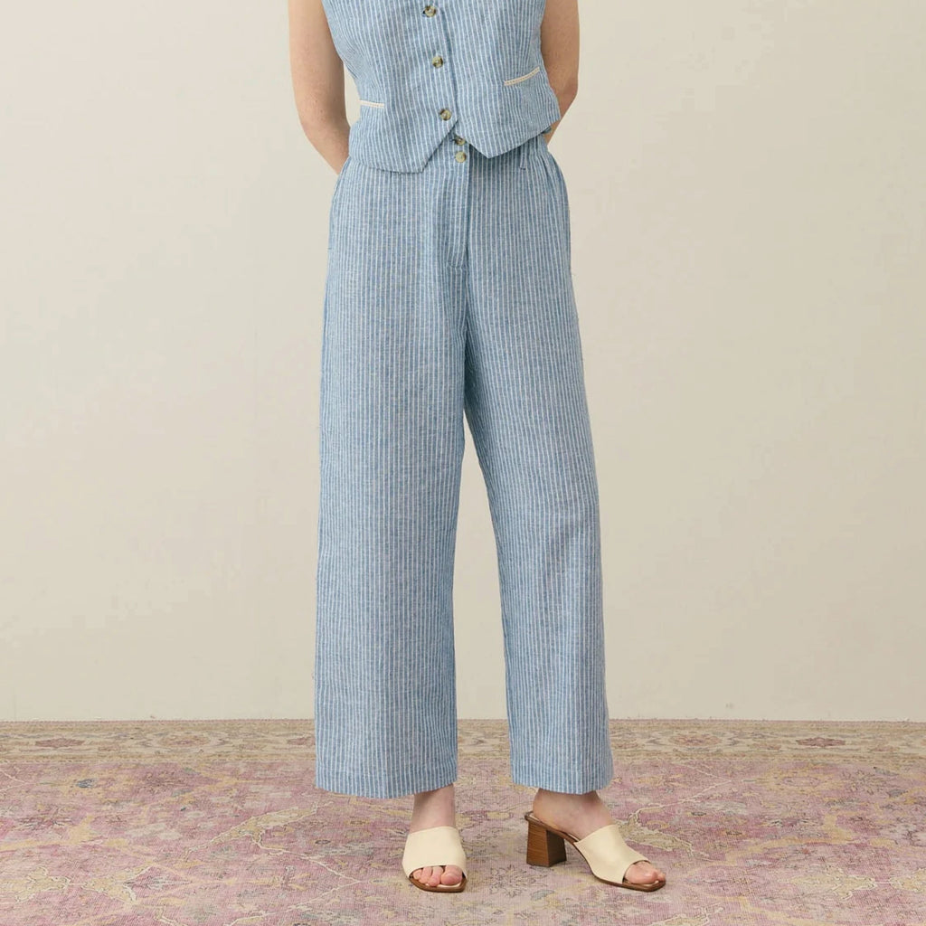 Classic blue Onda Striped Aubela Trousers in cotton and linen pants in a loose, straight cut.Louise Misha Blue Onda Striped Abuela Trousers - Jo And Co Louise Misha Blue Onda Striped Abuela Trousers - Louise Misha