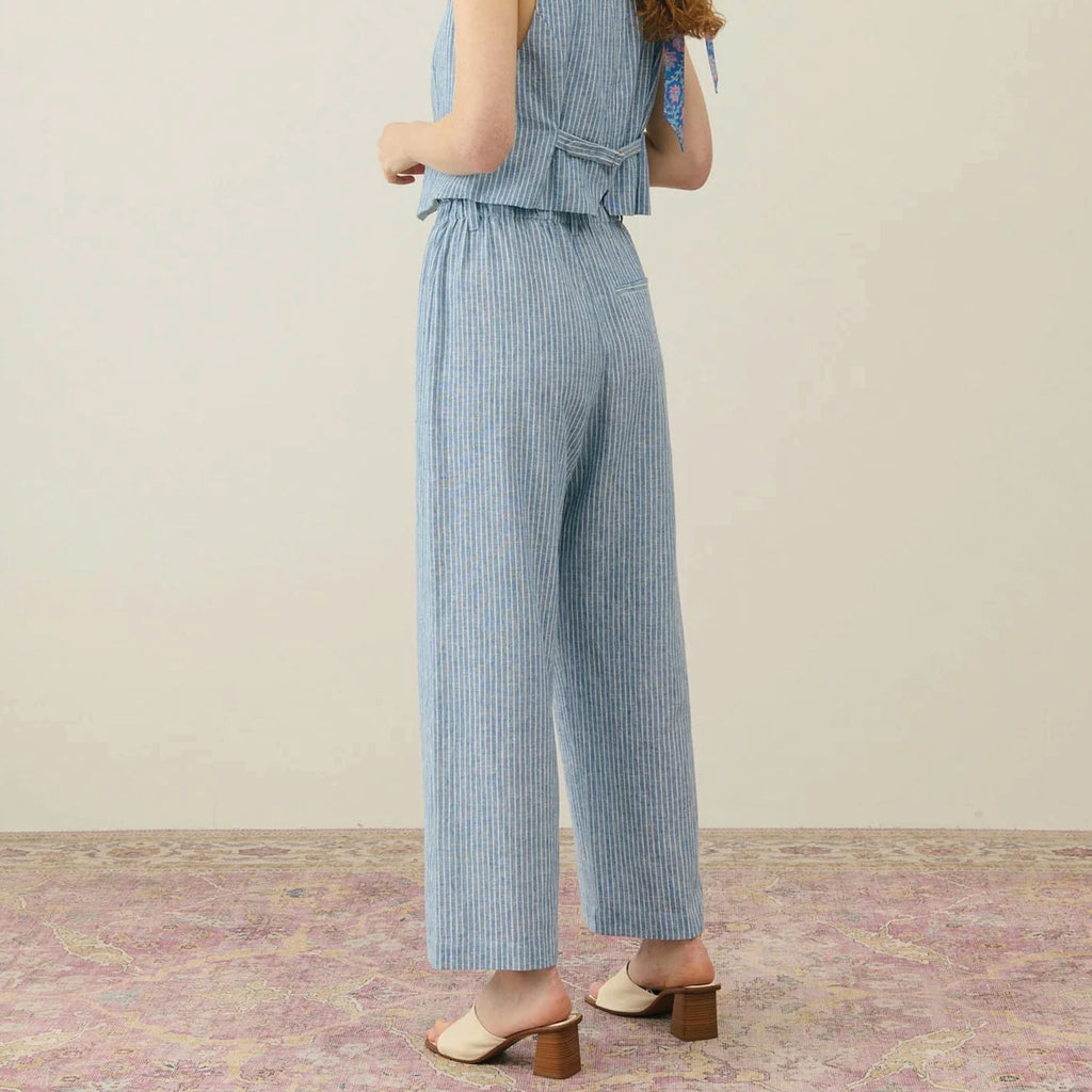 Classic blue Onda Striped Aubela Trousers in cotton and linen pants in a loose, straight cut.Louise Misha Blue Onda Striped Abuela Trousers - Jo And Co Louise Misha Blue Onda Striped Abuela Trousers - Louise Misha