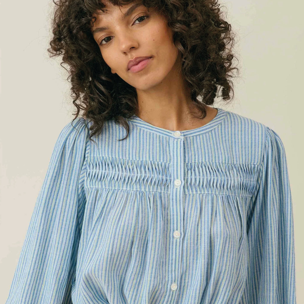 A blue and white blouse with pin stripe, buttoned centre, round neckline and lace inserts.
Louise Misha Blue Parasol Striped Jally Blouse - Jo And Co Louise Misha Blue Parasol Striped Jally Blouse - Louise Misha