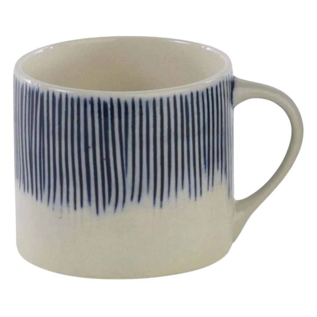 White clay mug with hand-painted thin blue lines.
Blue Small Karuma Mug - Jo And Co Blue Small Karuma Mug