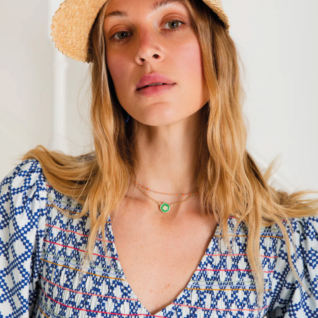 A tiered, smocked bodice dress in a geometric organic cotton poplin print with v-neck.
Bonté Blue & White Troy Dress - Jo And Co Bonté Blue & White Troy Dress - Bonté