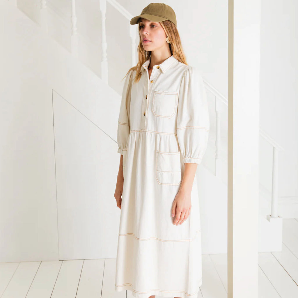 Relaxed fitting utility ecru denim dress with ric-rac detailing with contrast tan topstitching.
Bonté Ecru Adriane Dress - Jo And Co Bonté Ecru Adriane Dress - Bonté Ecru Adriane Dress