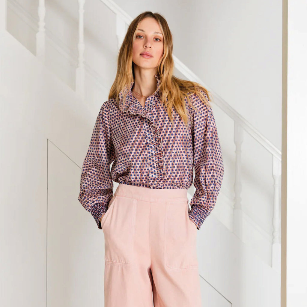 Relaxed shirt in a hand printed ecru and brown block print in organic cotton. Half placket opening with frill detail around collar and placket. Full length sleeves with smocked cuff.
Bonté Ecru & Brown Aida Shirt - Jo And Co Bonté Ecru & Brown Aida Shirt - Bonté