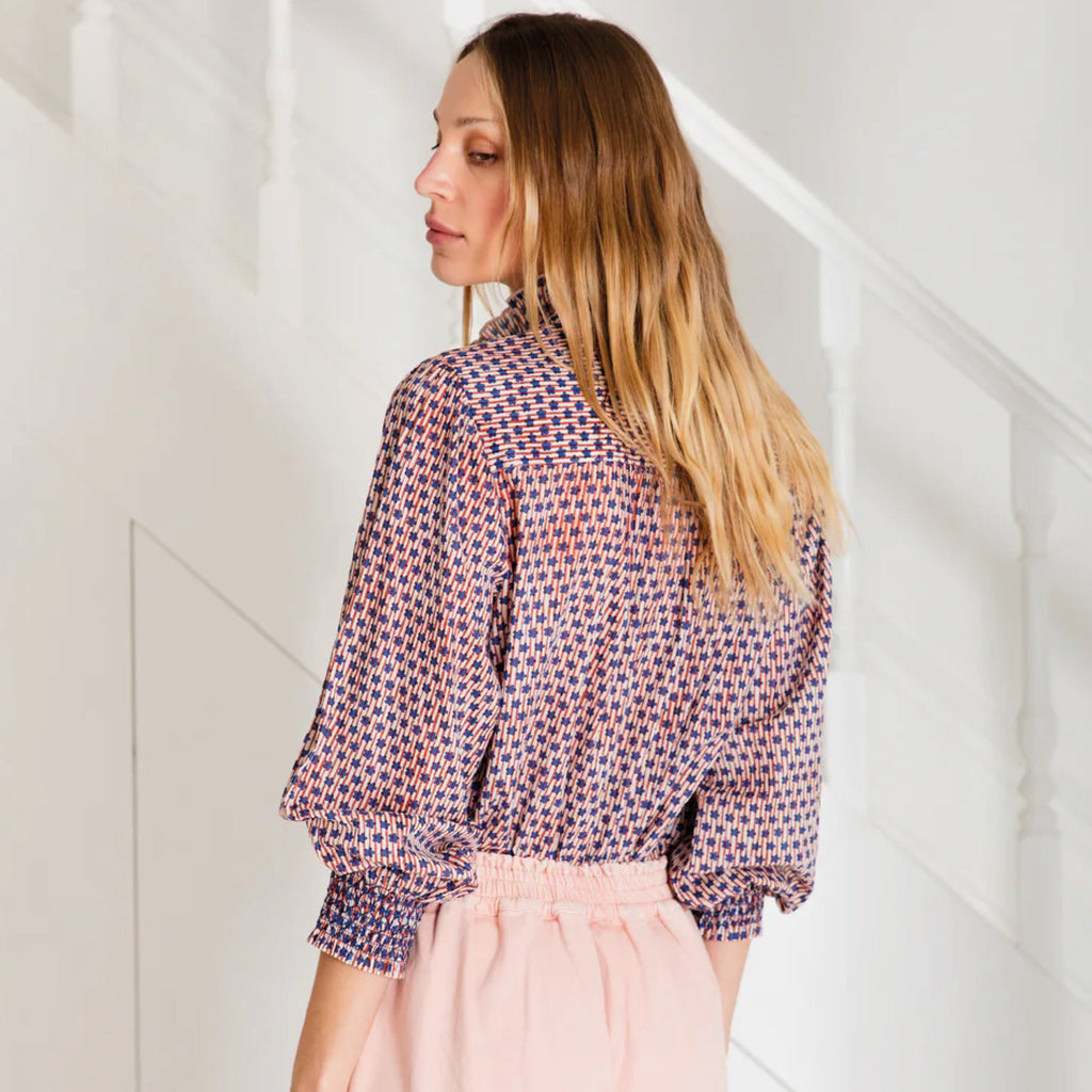 Relaxed shirt in a hand printed ecru and brown block print in organic cotton. Half placket opening with frill detail around collar and placket. Full length sleeves with smocked cuff.
Bonté Ecru & Brown Aida Shirt - Jo And Co Bonté Ecru & Brown Aida Shirt - Bonté