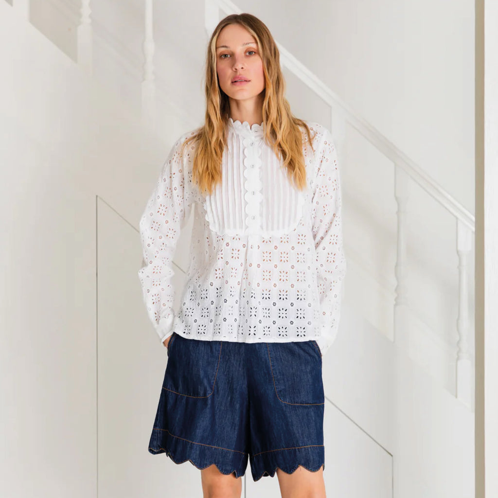 White bib-front shirt in organic cotton broderie with contrast bib and cuffs and stand collar with ric-rac trim detail.
Bonté White Genette Shirt - Jo And Co Bonté White Genette Shirt - Bonté