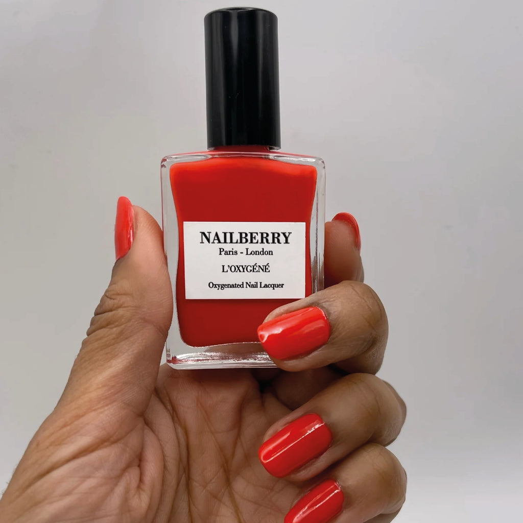 Bright red-orange nail polish.
Nailberry Cherry Cherie Nail Polish - Jo And Co Nailberry Cherry Cherie Nail Polish - Nailberry