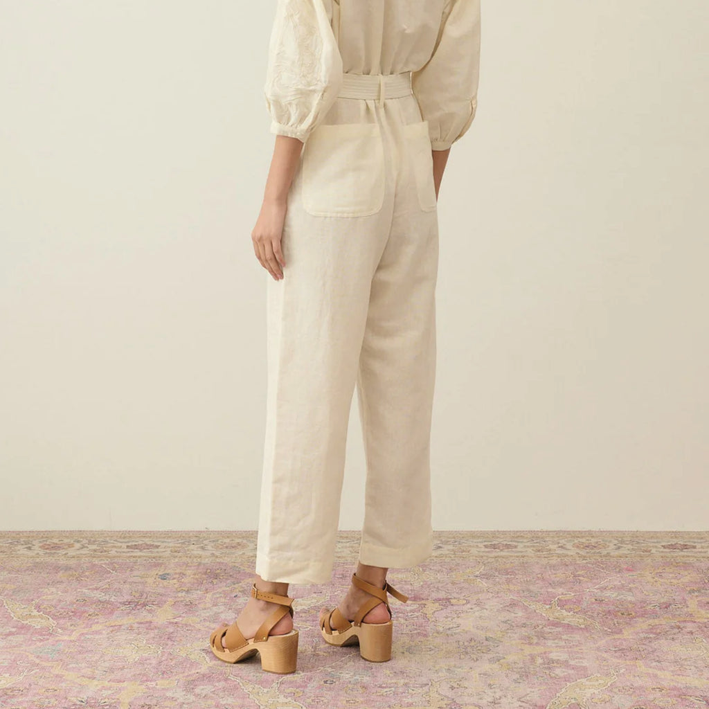 Cream cotton and linen blend jumpsuit with round neckline, lightly quilted breastplate with embroidery details. 
Louise Misha Cream Sylvianna Jumpsuit - Jo And Co Louise Misha Cream Sylvianna Jumpsuit - Louise Misha