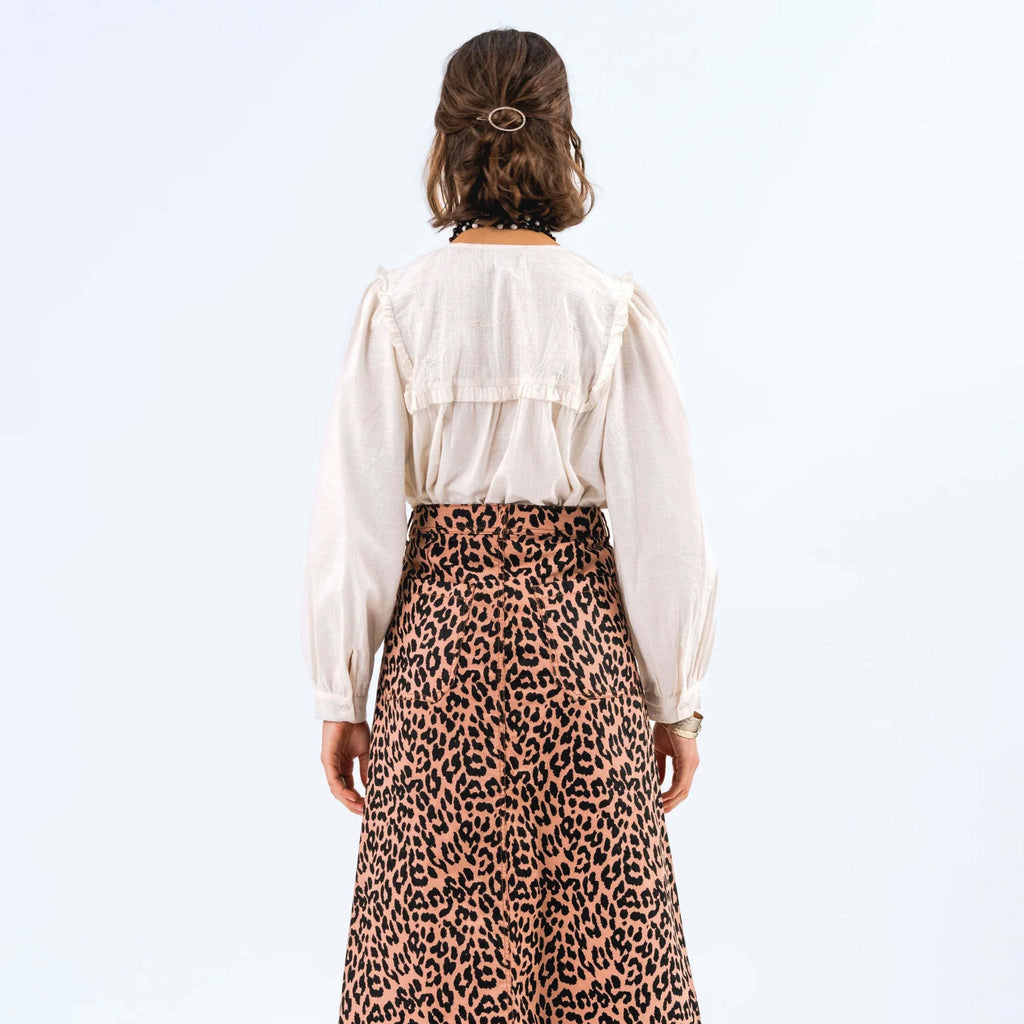 Off-white Lollys Laundry Creme Dooble Blouse with embroidered collar and long puff sleeves.