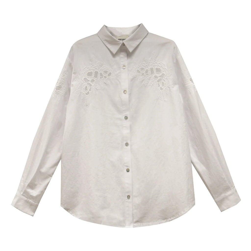 Garance Paris Ecru Tess Embroidered Shirt with pearl buttons and classic collar.
Garance Paris Ecru Tess Embroidered Shirt - Jo And Co Garance Paris Ecru Tess Embroidered Shirt - Garance Paris