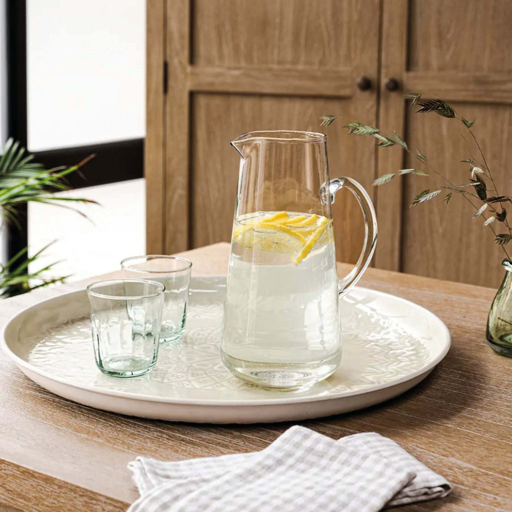 Fonthill Glass Jug with tapered design on a tray with glasses.