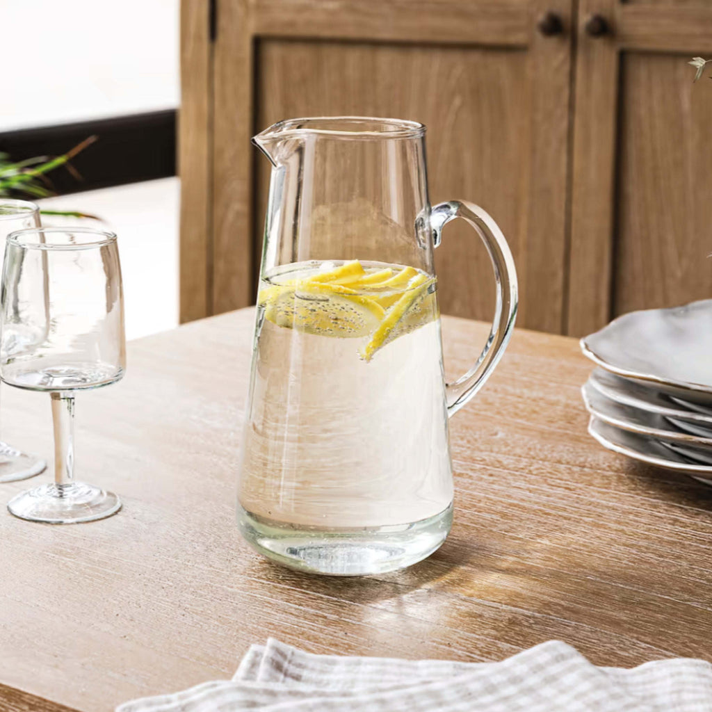 Fonthill Glass Jug with tapered design on dining table.