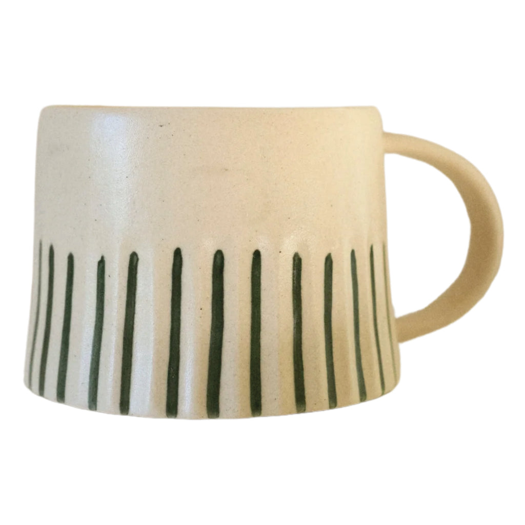 Hand finished stoneware mug with a matte glaze at the bottom with carved ridges with painted forest green stripes in the dips.
Forest Ridged Painted Mug - Jo And CoForest Ridged Painted Mug