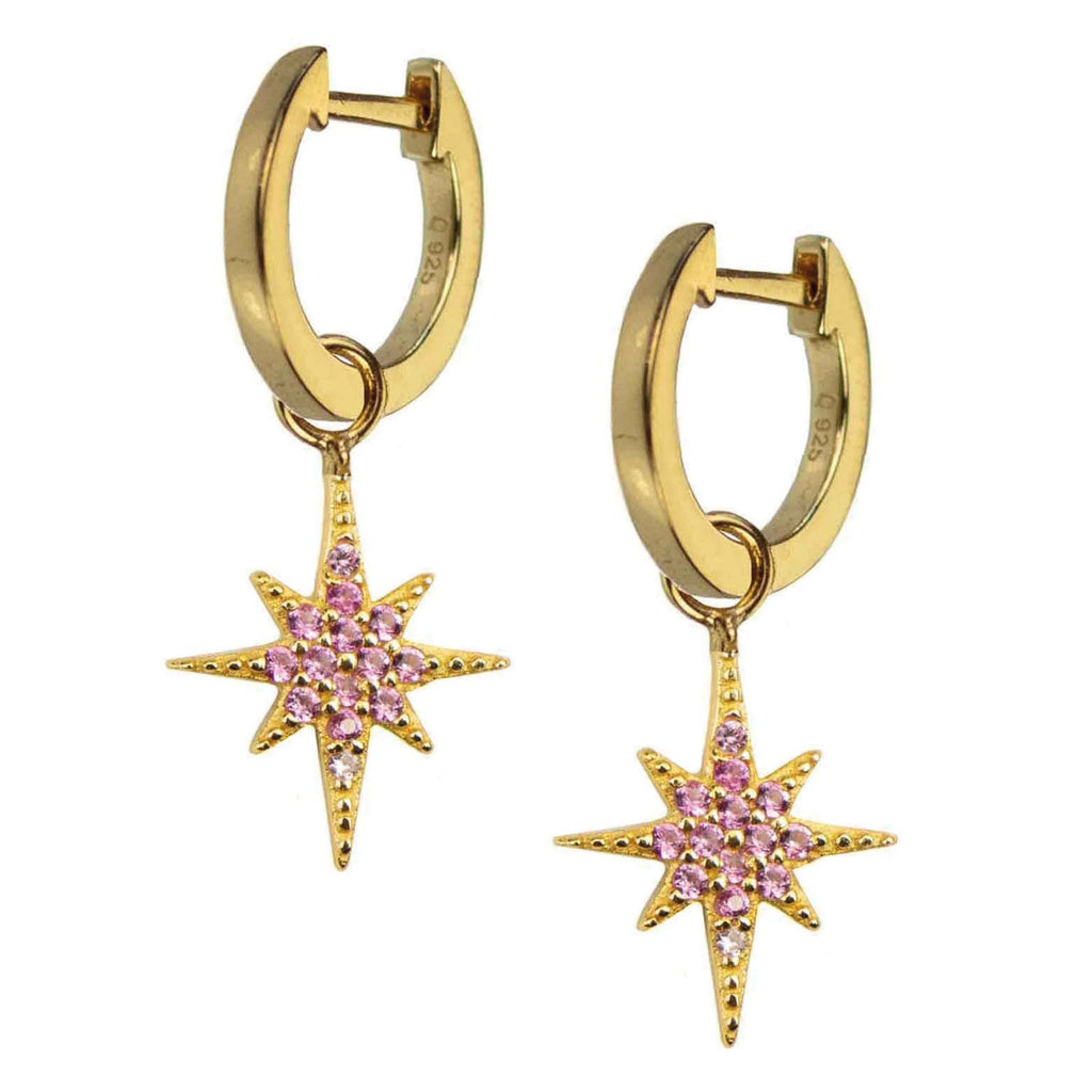 Gold hoop earrings with pink cubic zirconia star pendants from Hultquist Copenhagen.