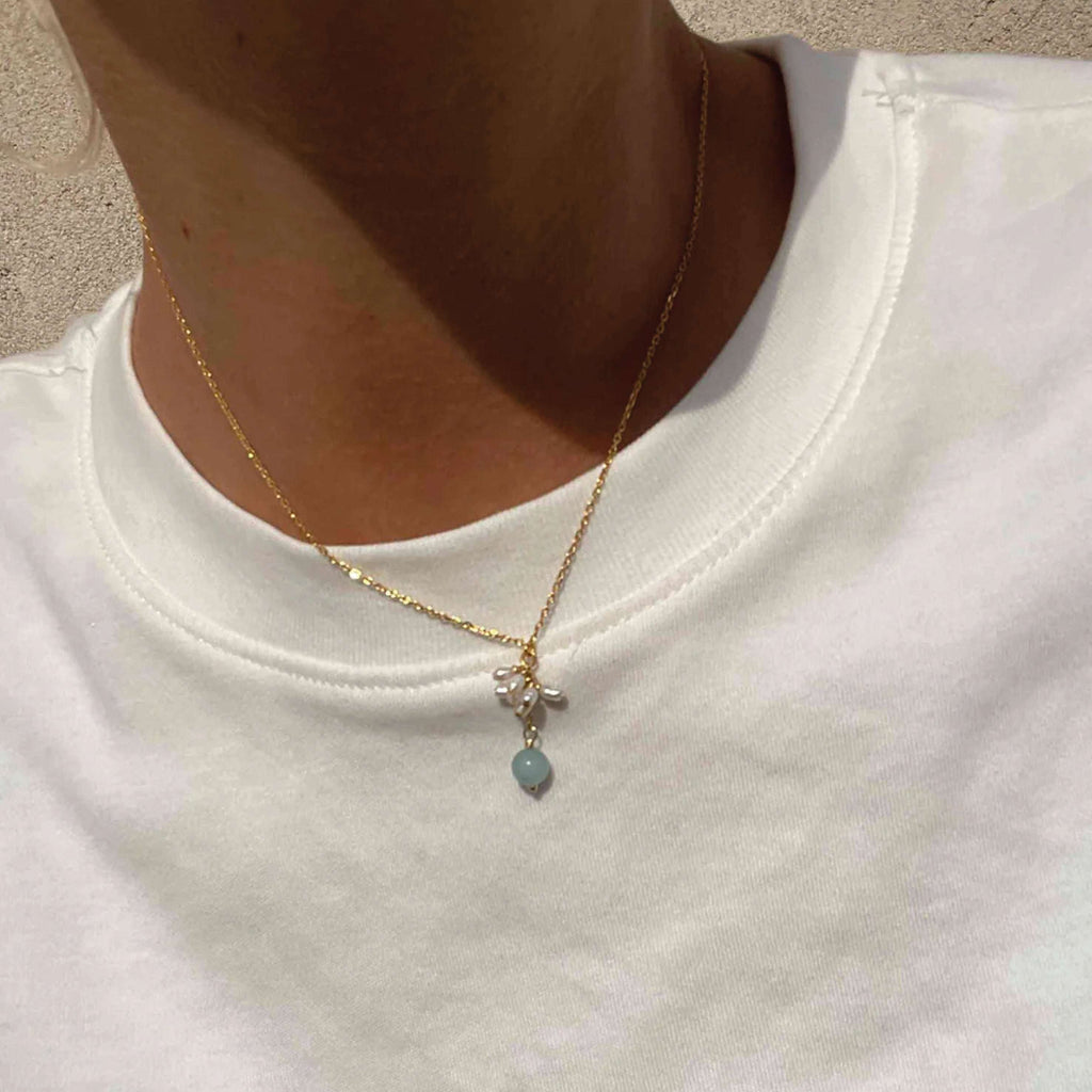 Hultquist Copenhagen Lunaris Necklace in 18K gold-plated sterling silver worn on a person.