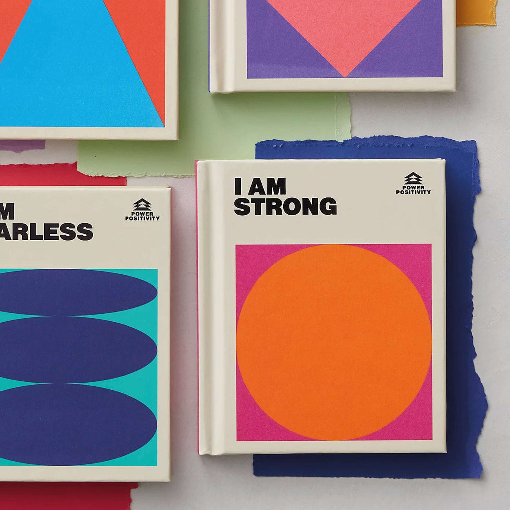 I Am Strong Book with vibrant geometric cover design, pocket-sized hardback.