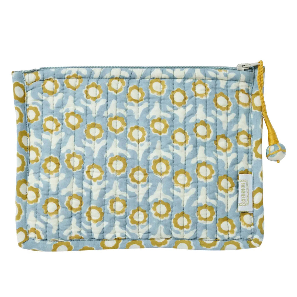 Isha Blue Small Pouch with bohemian print, handmade pompoms, and quilted design.