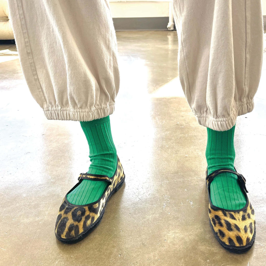 Le Bon Shoppe Kelly Green ribbed socks in breathable cotton blend worn with leopard print shoes.