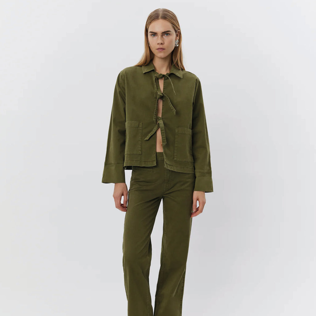 Khaki army green denim jacket with tie front closure and two large front pockets.
Sofie Schnoor Khaki Army Jacket - Jo And Co Sofie Schnoor Khaki Army Jacket - Sofie Schnoor