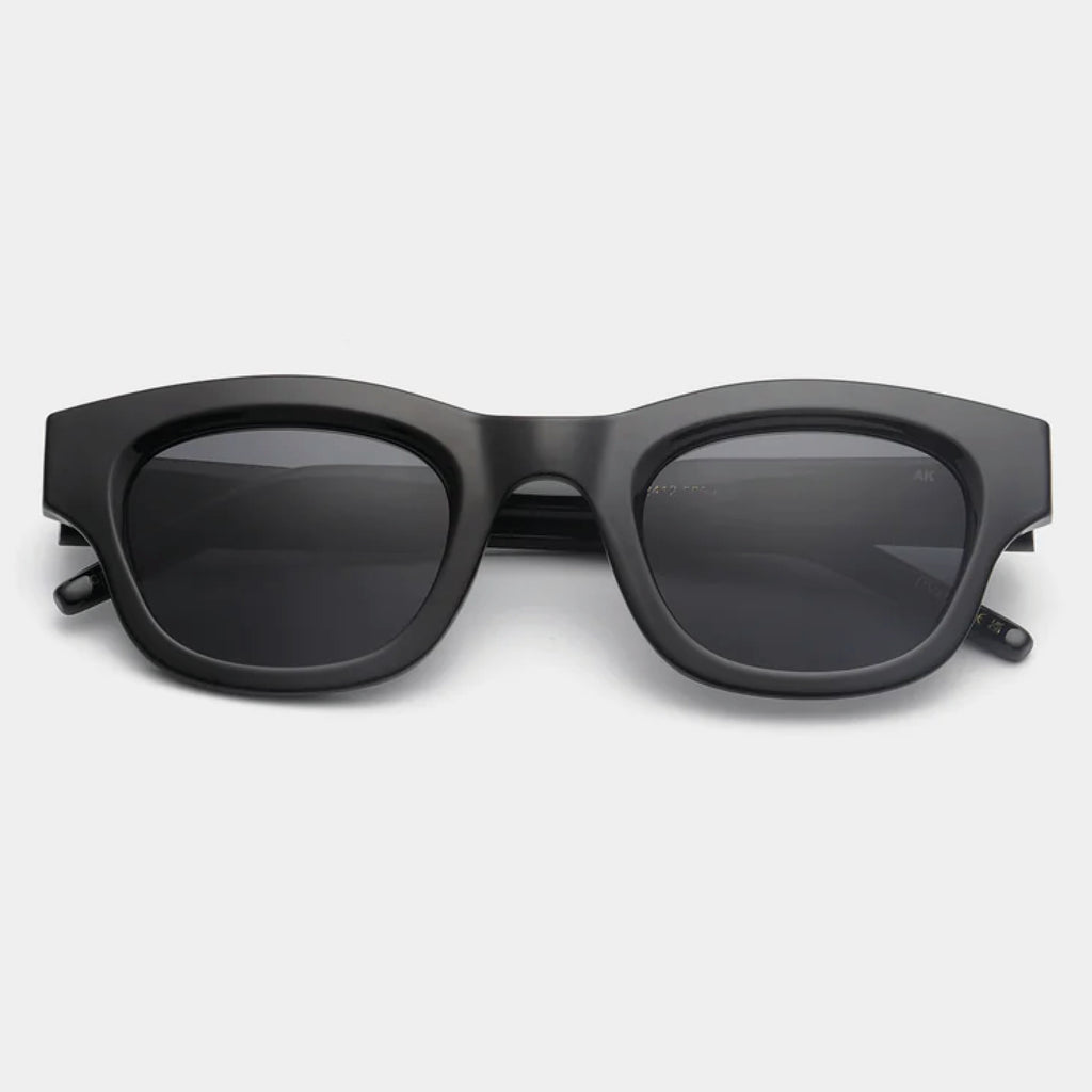 Black sunglasses with linear bottom and a rounded top.
A.KJAERBEDE Lane Black Sunglasses - Jo And Co A.KJAERBEDE Lane Black Sunglasses - A.KJAERBEDE