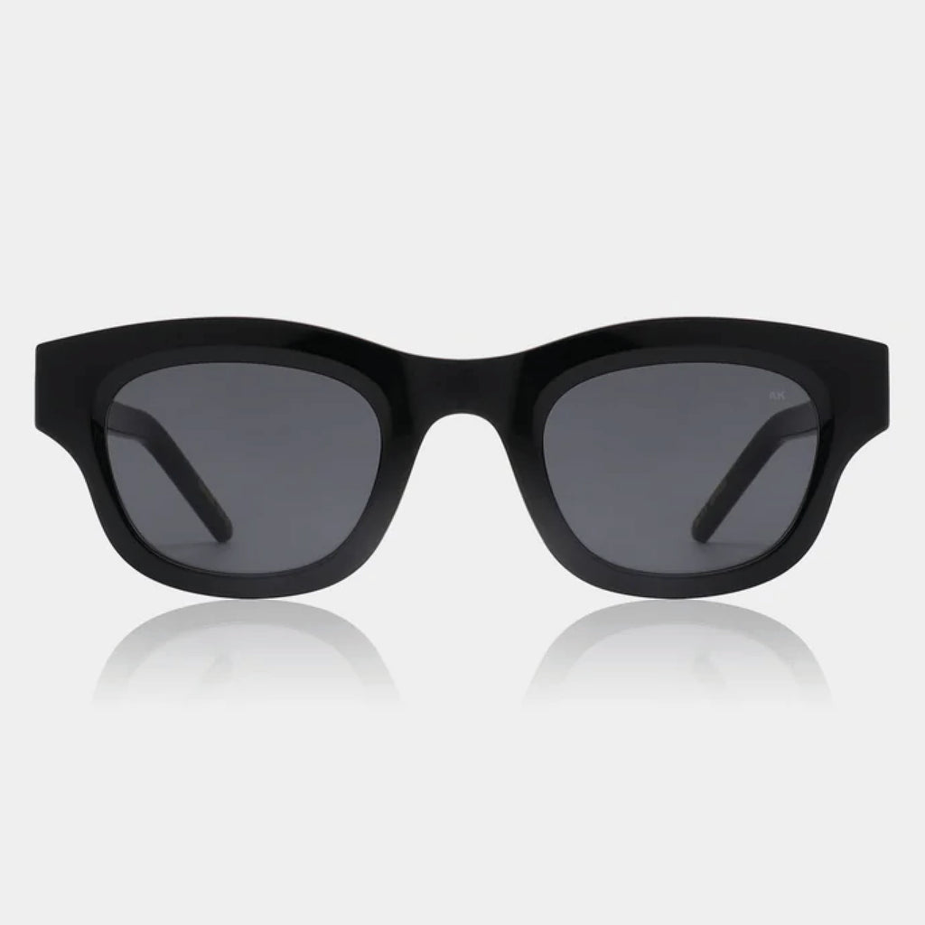 Black sunglasses with linear bottom and a rounded top.
A.KJAERBEDE Lane Black Sunglasses - Jo And Co A.KJAERBEDE Lane Black Sunglasses - A.KJAERBEDE