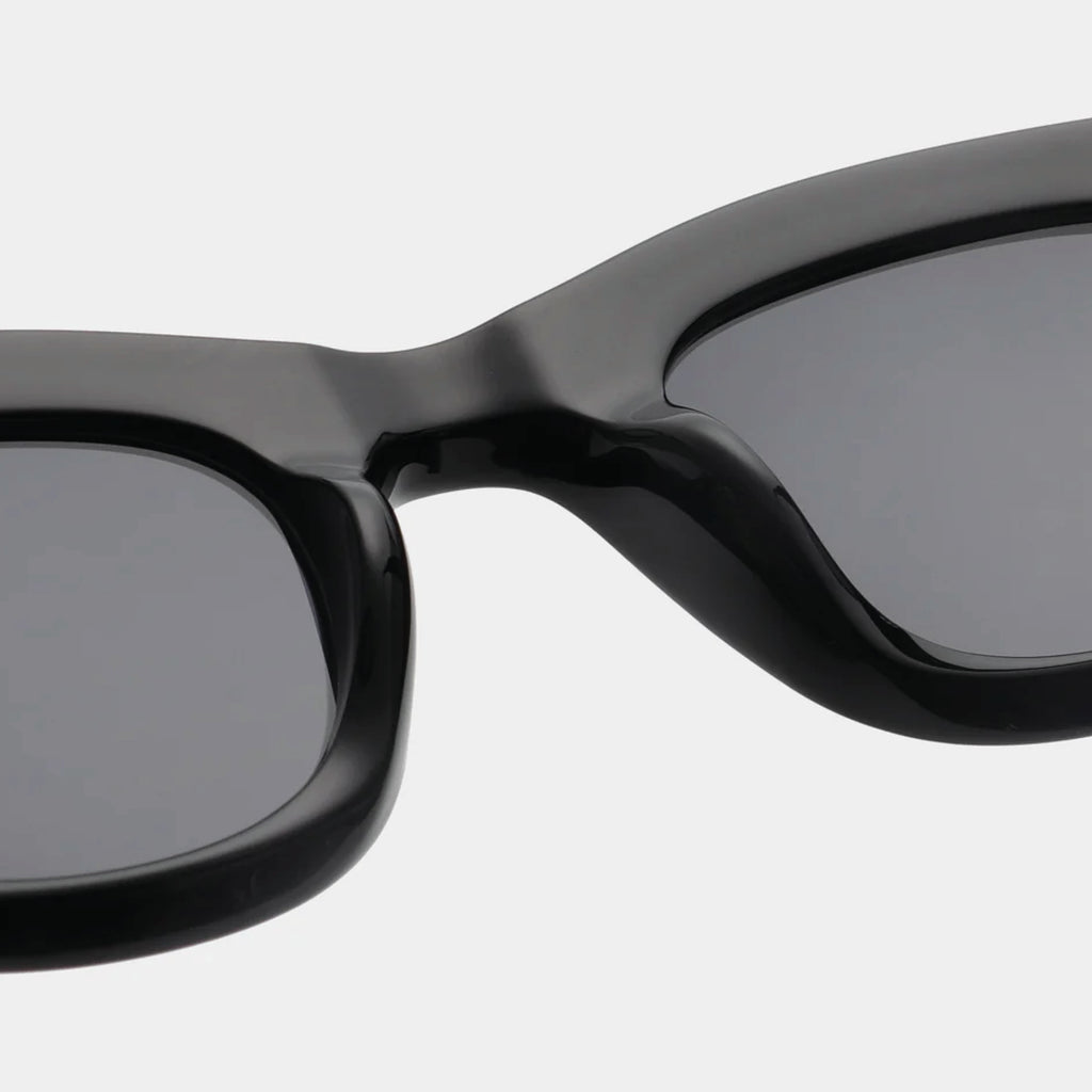 Black sunglasses with linear bottom and a rounded top.
A.KJAERBEDE Lane Black Sunglasses - Jo And Co A.KJAERBEDE Lane Black Sunglasses - A.KJAERBEDE