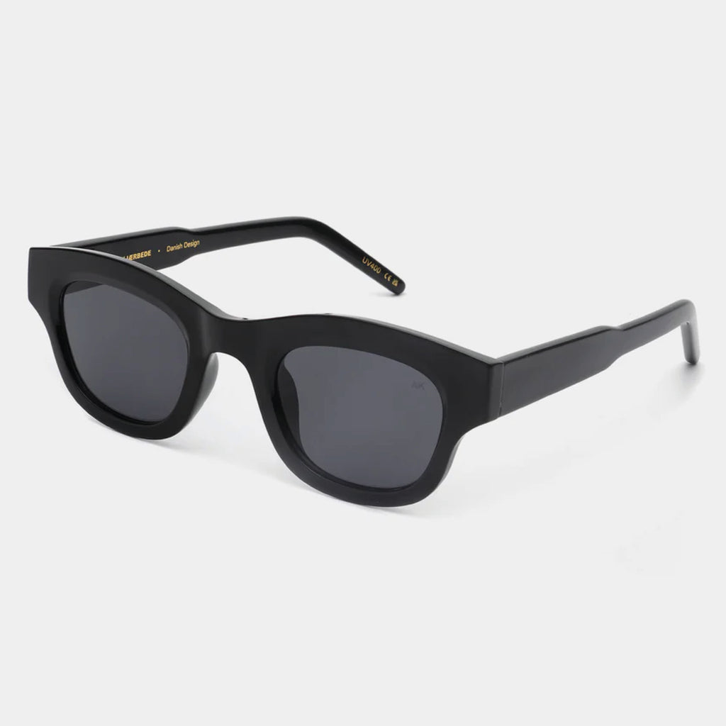 Black sunglasses with linear bottom and a rounded top.
A.KJAERBEDE Lane Black Sunglasses - Jo And Co A.KJAERBEDE Lane Black Sunglasses - A.KJAERBEDE