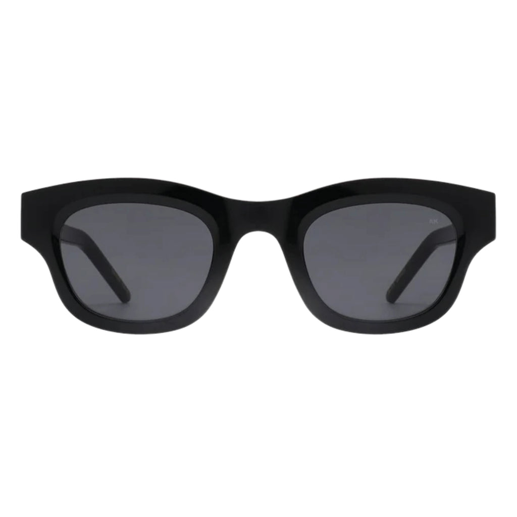 Black sunglasses with linear bottom and a rounded top.
A.KJAERBEDE Lane Black Sunglasses - Jo And Co A.KJAERBEDE Lane Black Sunglasses - A.KJAERBEDE