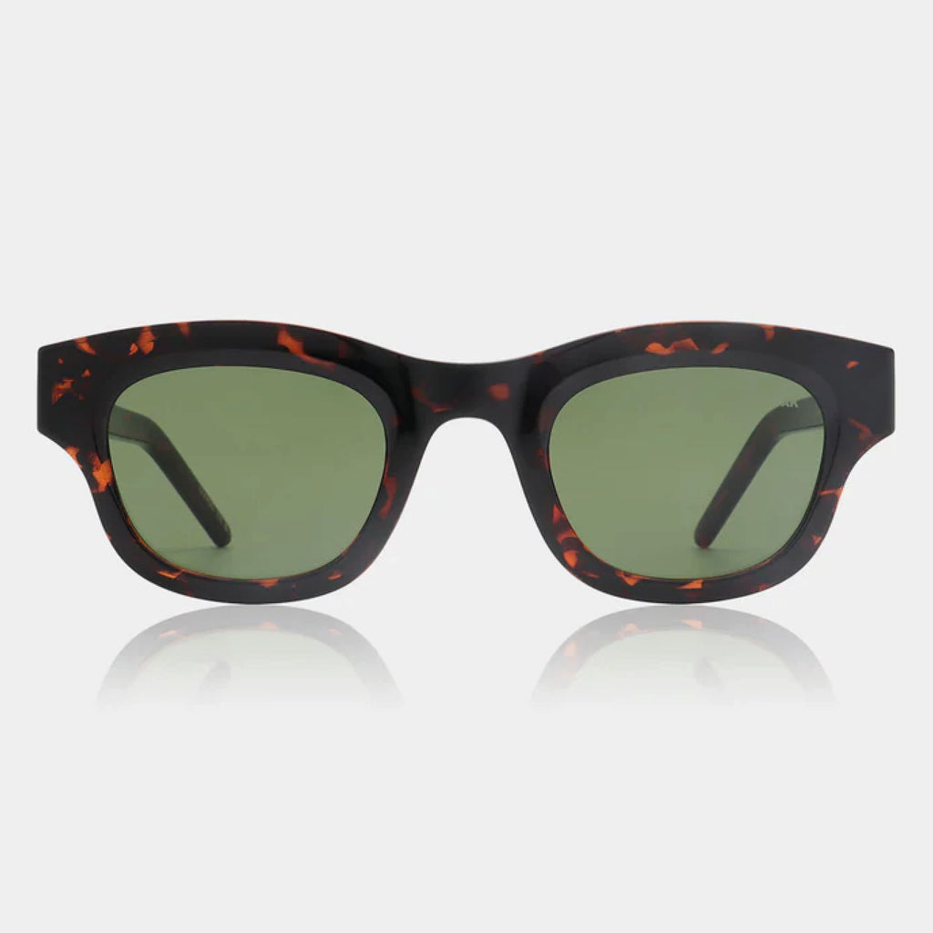 Tortoise shell frame sunglasses with linear bottom and a rounded top and green lens.
A.KJAERBEDE Lane Demi Tortoise Sunglasses - Jo And Co A.KJAERBEDE Lane Demi Tortoise Sunglasses - A.KJAERBEDE