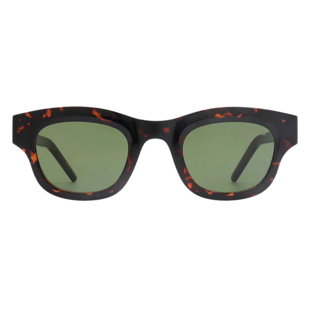 Tortoise shell frame sunglasses with linear bottom and a rounded top and green lens.
A.KJAERBEDE Lane Demi Tortoise Sunglasses - Jo And Co A.KJAERBEDE Lane Demi Tortoise Sunglasses - A.KJAERBEDE