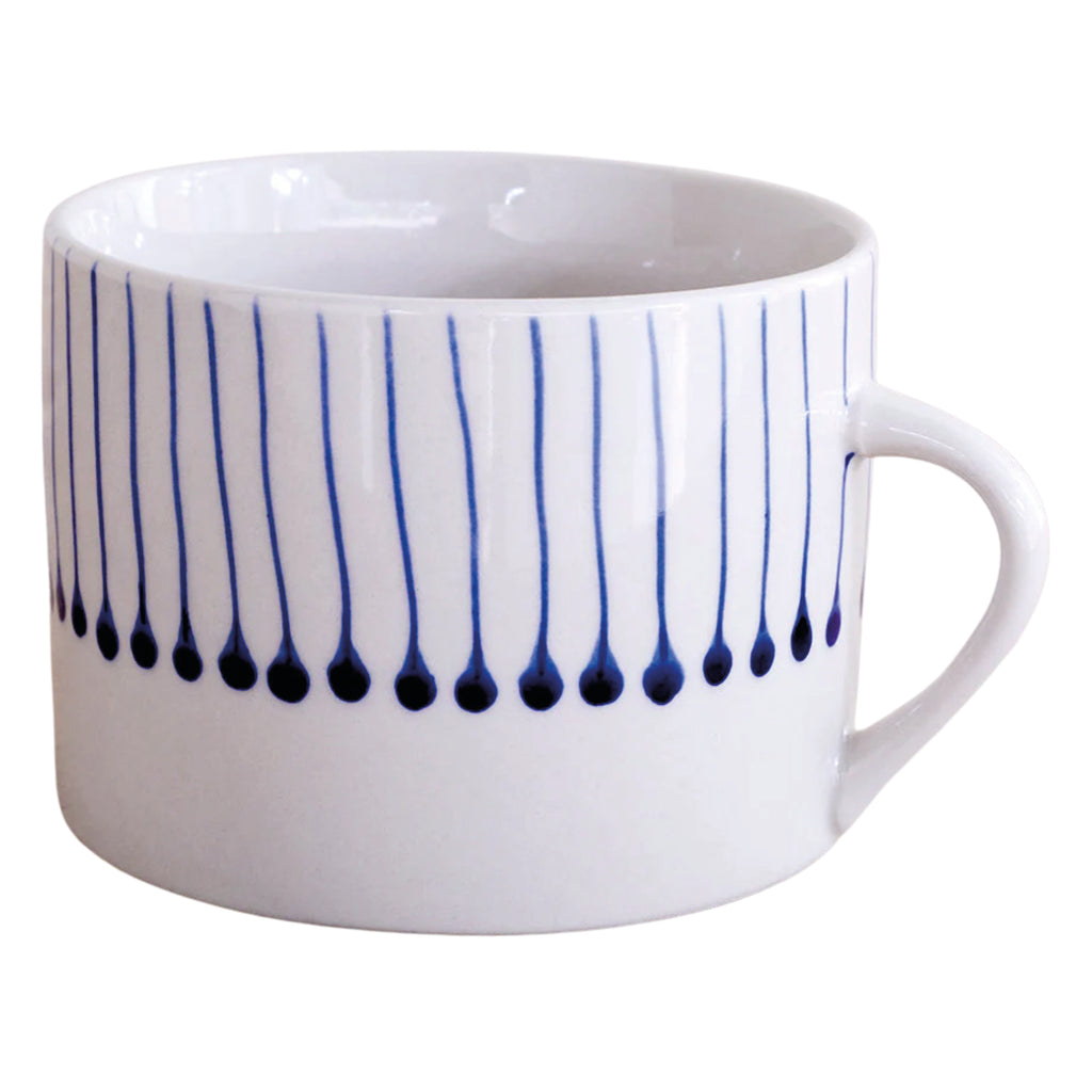 Hand-painted ceramic mug with indigo blue paint drops.
Large Indigo Iba Mug - Jo And Co Large Indigo Iba Mug