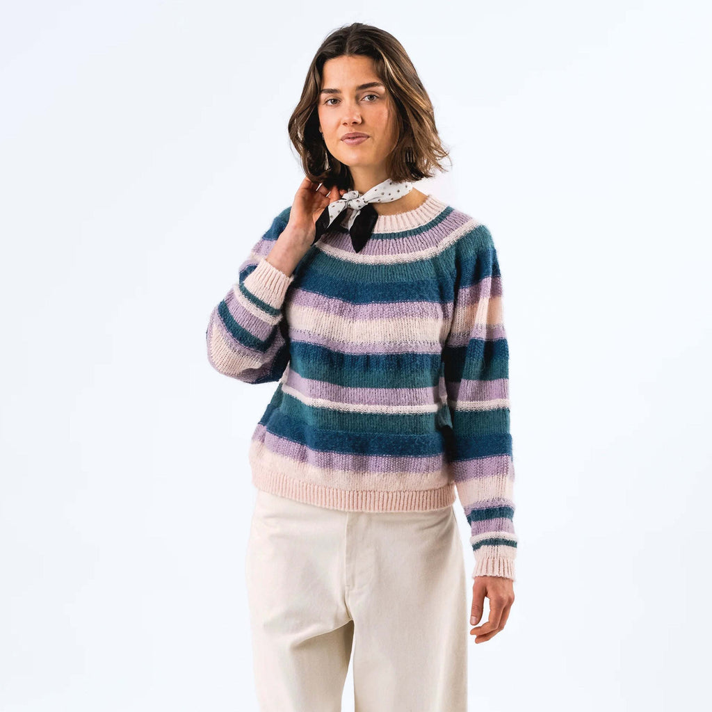 Lollys Laundry Lavender Bjork Knit with blue, lilac, cream, and green stripes, fluffy finish, and relaxed silhouette.