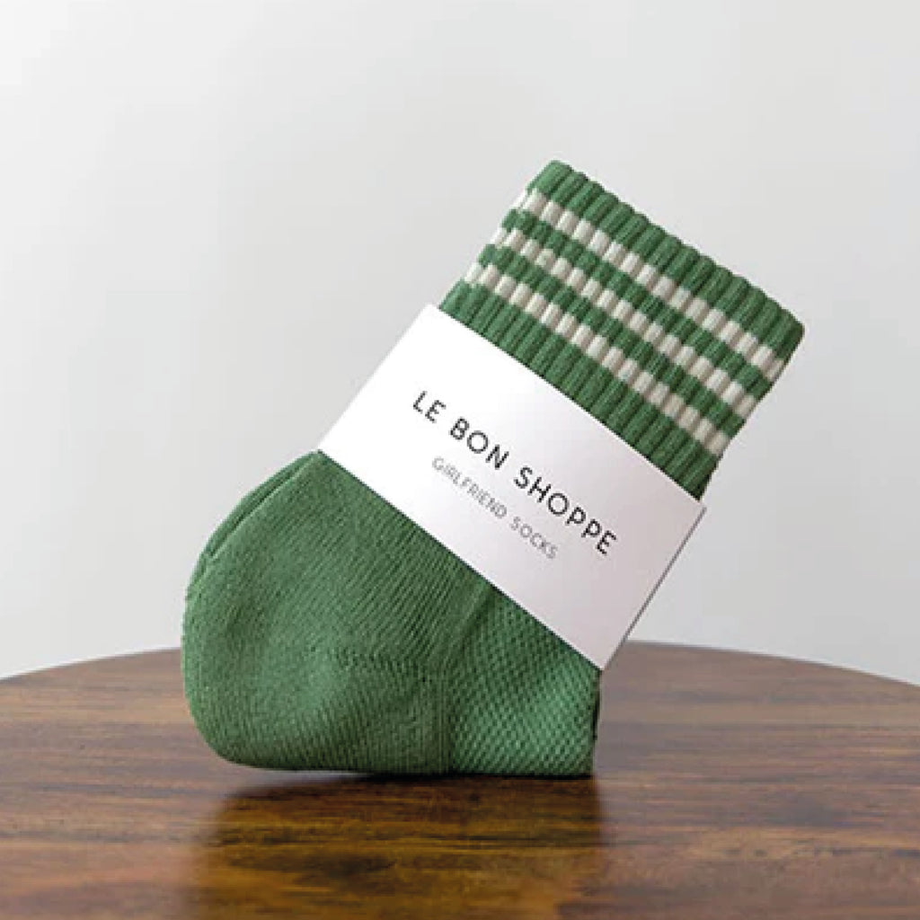 Avocado green socks with triple contrast stripe, short crew sock length and Le Bon Shoppe text on sole.
Le Bon Shoppe Avocado Girlfriend Socks - Jo And Co Le Bon Shoppe Avocado Girlfriend Socks - Le Bon Shoppe