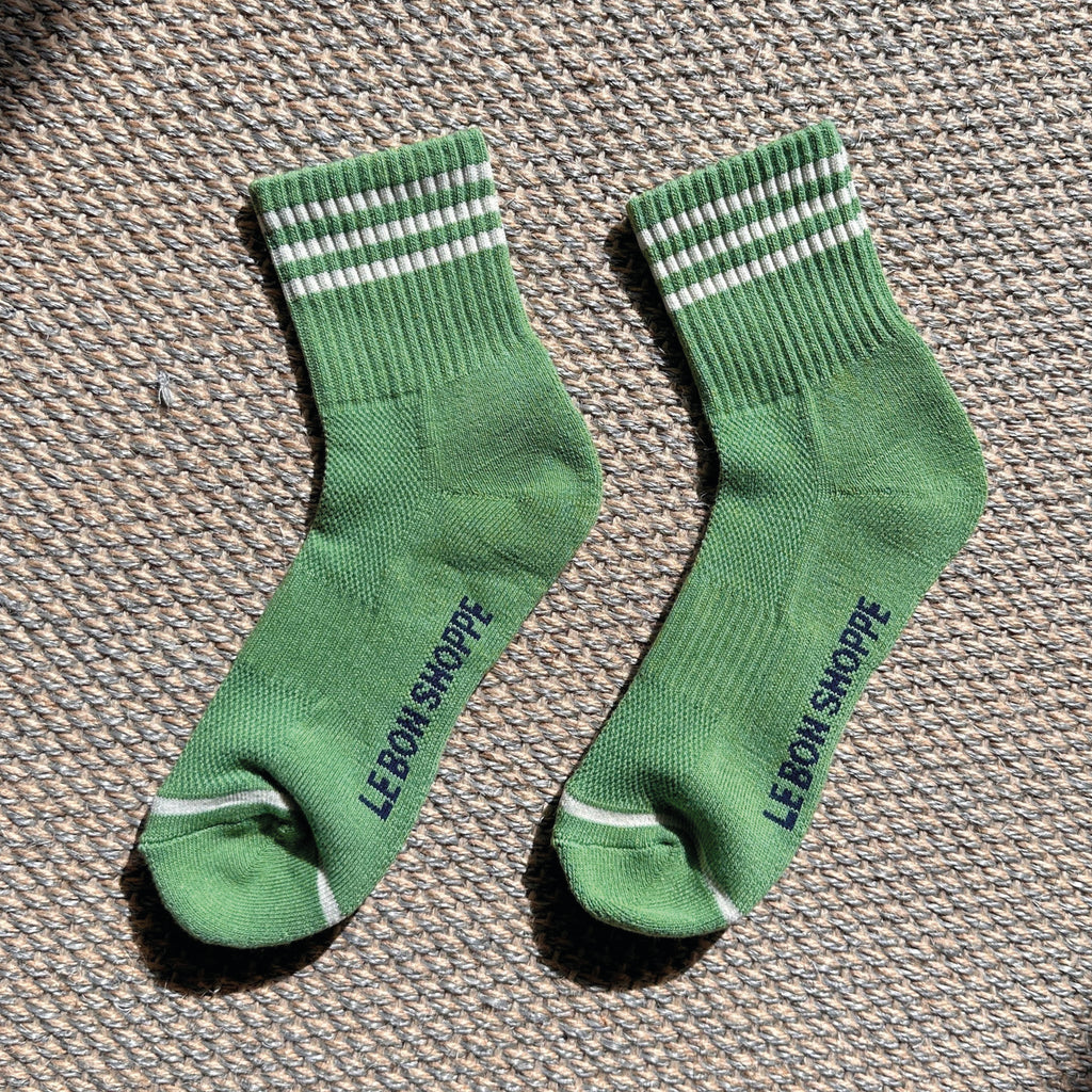 Avocado green socks with triple contrast stripe, short crew sock length and Le Bon Shoppe text on sole.
Le Bon Shoppe Avocado Girlfriend Socks - Jo And Co Le Bon Shoppe Avocado Girlfriend Socks - Le Bon Shoppe