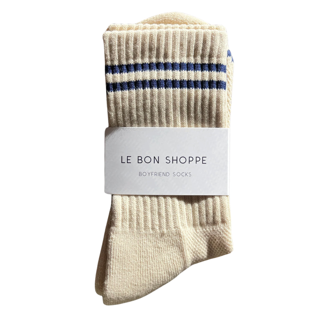 Cashew cream socks with double navy contrast stripe, crew sock length and red Le Bon Shoppe text on sole.
Le Bon Shoppe Cashew Boyfriend Socks - Jo And Co Le Bon Shoppe Cashew Boyfriend Socks - Le Bon Shoppe