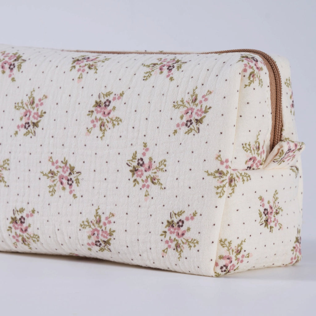 Crepe fabric wash bag with pink roses and sage green leaves pattern with tiny brown dots, and coordinating light brown zipper.
Lilac Floral Wash Bag - Jo And Co Lilac Floral Wash Bag