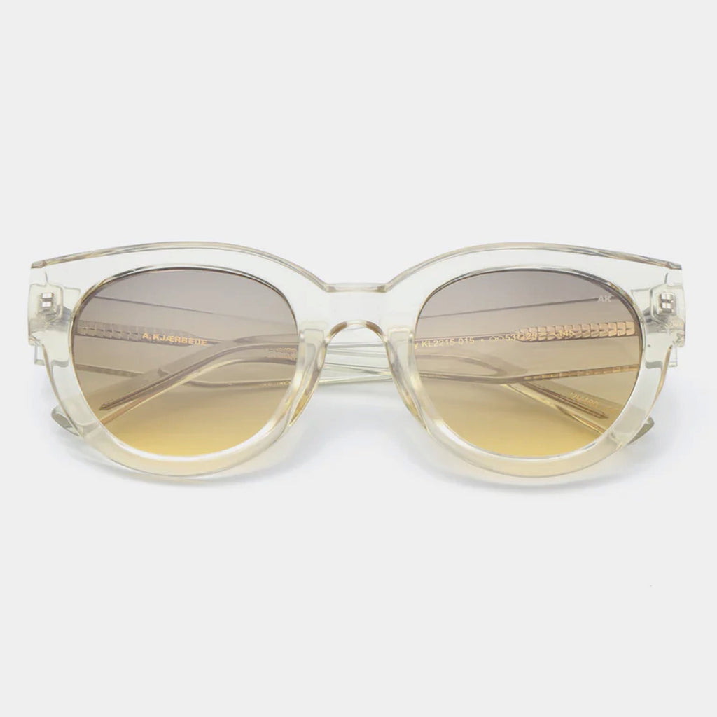 Oversized transparent frame sunglasses.
A.KJAERBEDE Lilly Ecru Transparent Sunglasses - Jo And Co A.KJAERBEDE Lilly Ecru Transparent Sunglasses - A.KJAERBEDE