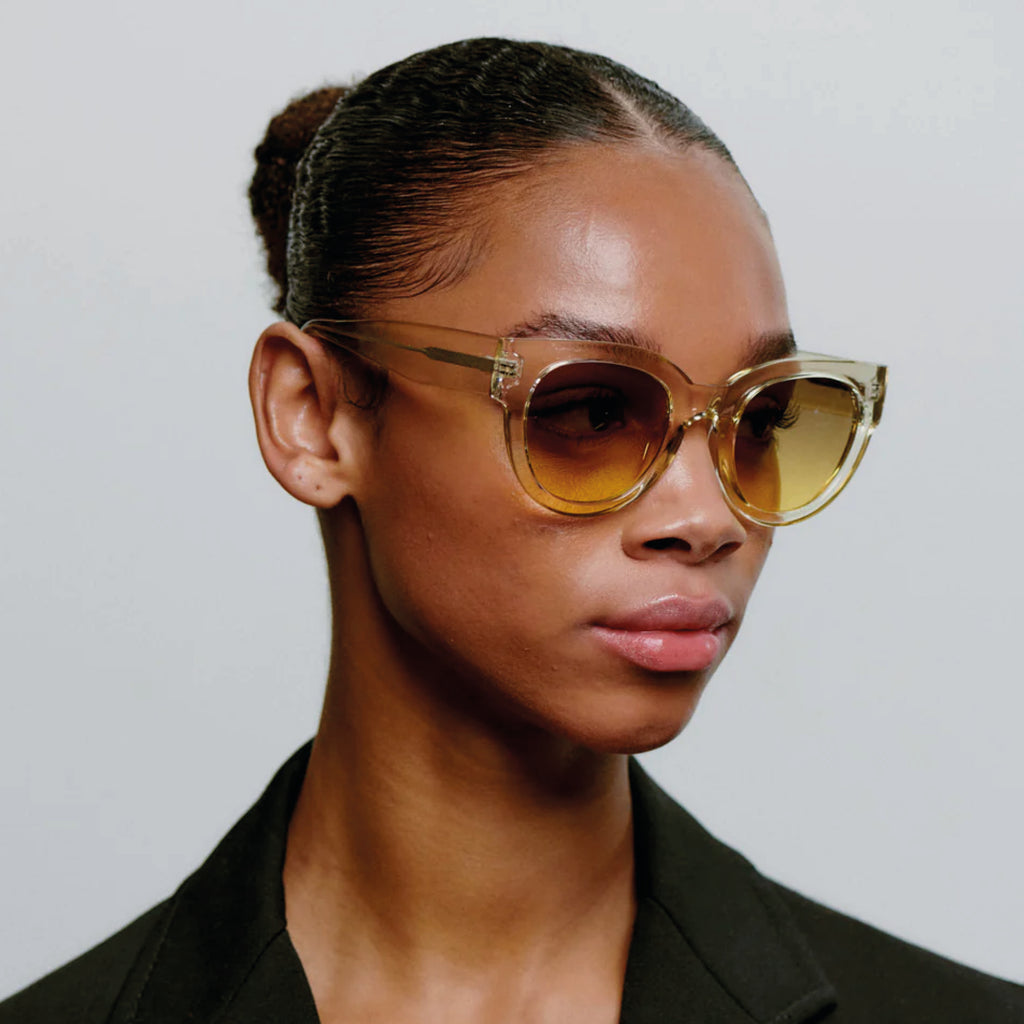 Oversized transparent frame sunglasses.
A.KJAERBEDE Lilly Ecru Transparent Sunglasses - Jo And Co A.KJAERBEDE Lilly Ecru Transparent Sunglasses - A.KJAERBEDE