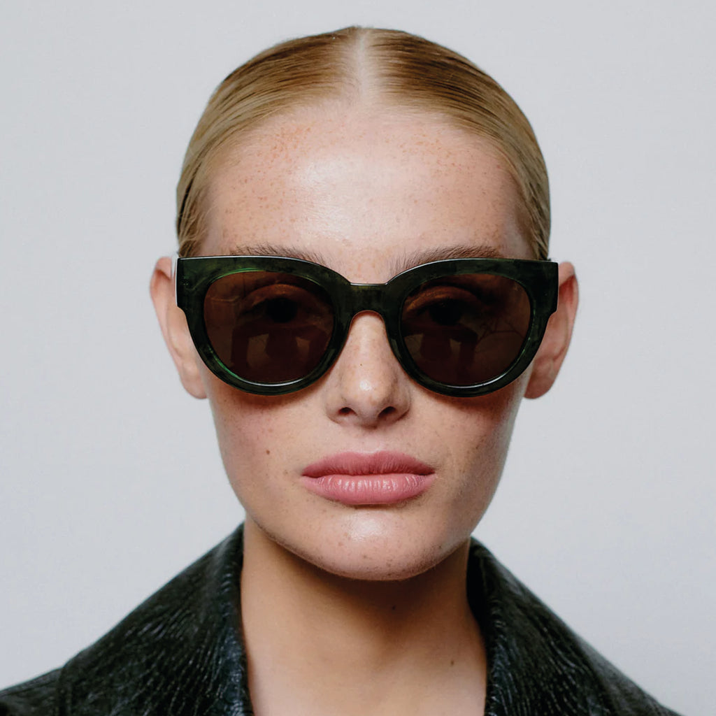 Oversized green marble frame sunglasses.
A.KJAERBEDE Lilly Green Marble Transparent Sunglasses - Jo And Co A.KJAERBEDE Lilly Green Marble Transparent Sunglasses - A.KJAERBEDE 