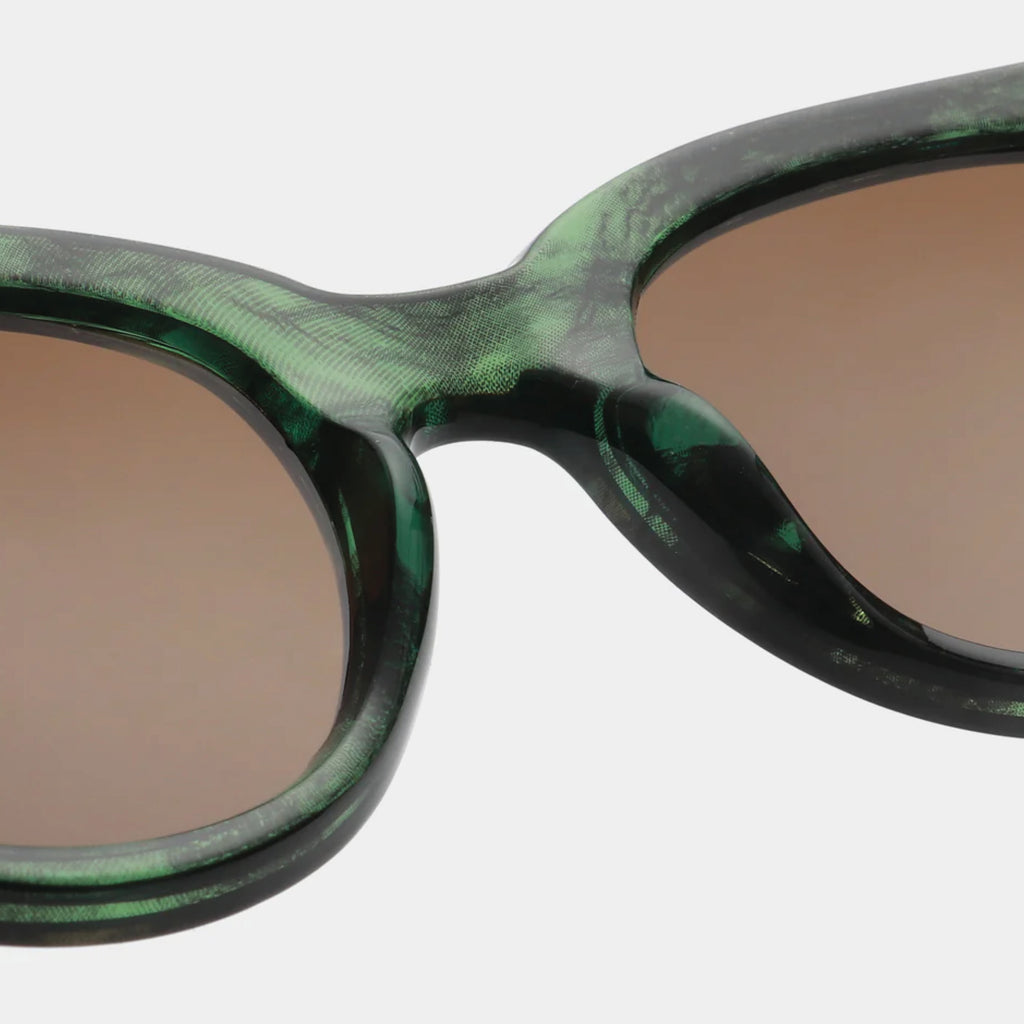 Oversized green marble frame sunglasses.
A.KJAERBEDE Lilly Green Marble Transparent Sunglasses - Jo And Co A.KJAERBEDE Lilly Green Marble Transparent Sunglasses - A.KJAERBEDE 