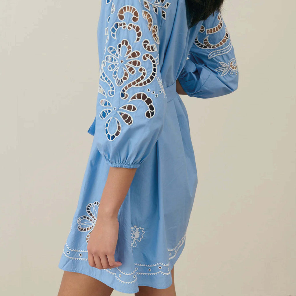 Blue dress in poplin cotton with openwork embroideries, button front and belt.
Louise Misha Blue Rinala Dress - Jo And Co Louise Misha Blue Rinala Dress - Louise Misha