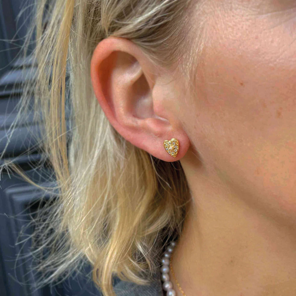 Hultquist Copenhagen Lucia Earrings in 18K gold-plated sterling silver worn on ear.