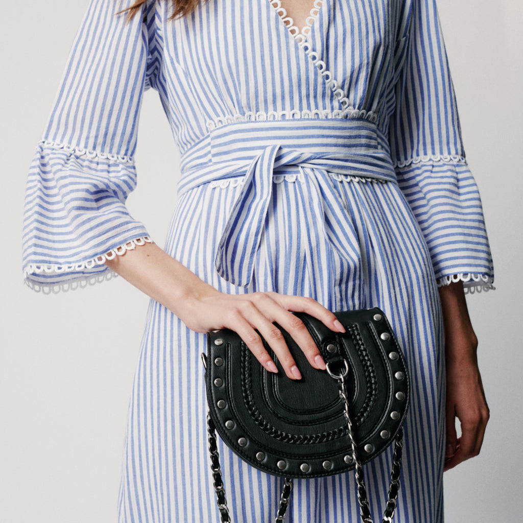 Long blue striped feminine dress with a ruffle detailed crossover v-neck and elastic waist with a flowy pleated panel at bottom.
Moliin Copenhagen Turkish Sea Dulce Dress - Jo And Co Moliin Copenhagen Turkish Sea Dulce Dress - Moliin Copenhagen