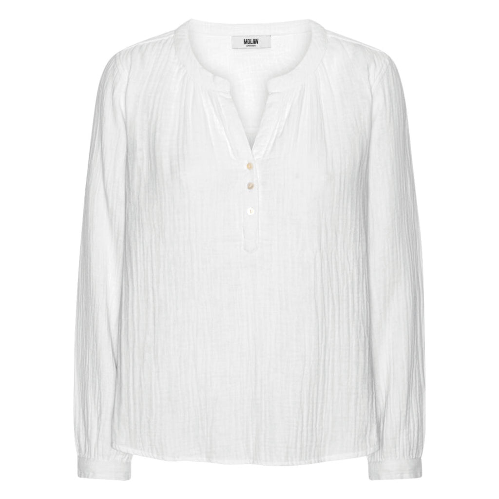 White straight fit shirt with round neck hole and buttons down upper front.
Moliin Copenhagen White Kimberly Blouse - Jo And Co Moliin Copenhagen White Kimberly Blouse - Moliin Copenhagen