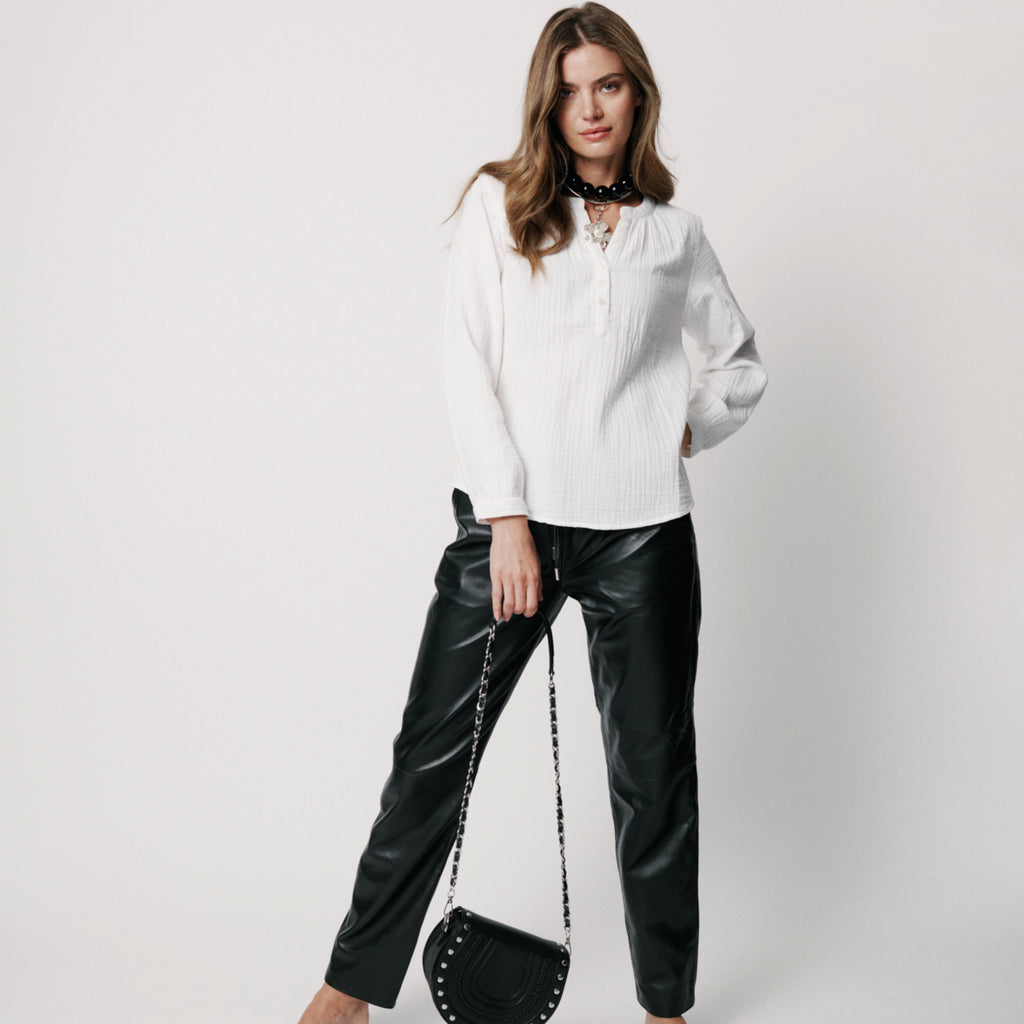 White straight fit shirt with round neck hole and buttons down upper front.
Moliin Copenhagen White Kimberly Blouse - Jo And Co Moliin Copenhagen White Kimberly Blouse - Moliin Copenhagen