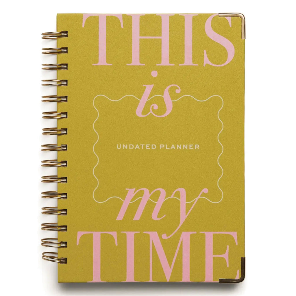 Time Undated Daily Planner with colorful cover, wire-bound, durable hardback, and gold-finish metal corners.